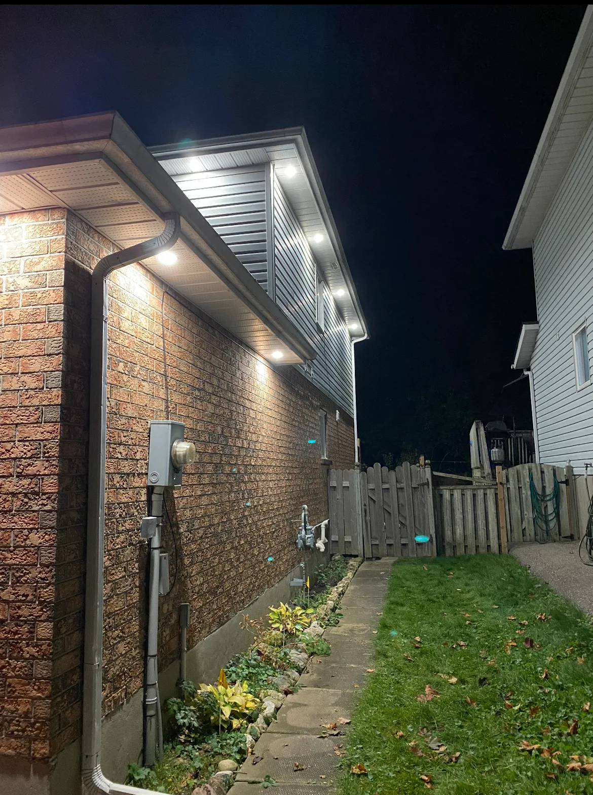 Helen's soffit pot light installation — second photo